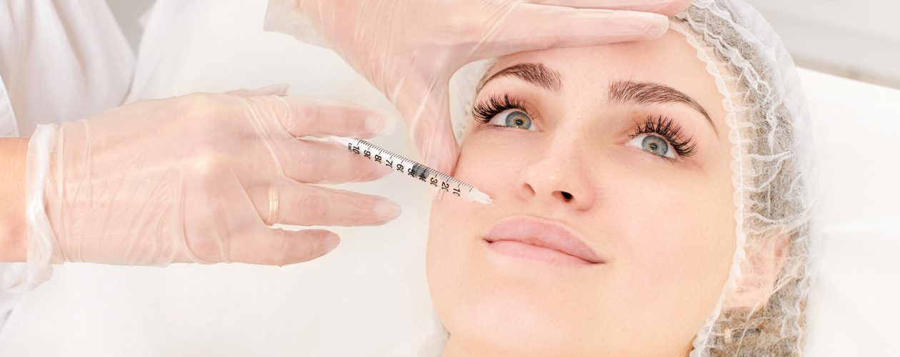 cosmetologist-makes-fillers-injection-for-lips-augmentation-and-volume