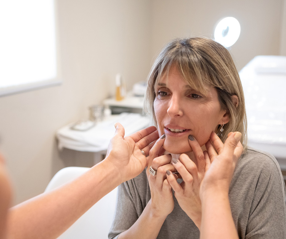 Dermatologist-in-consultation-with-female-patient