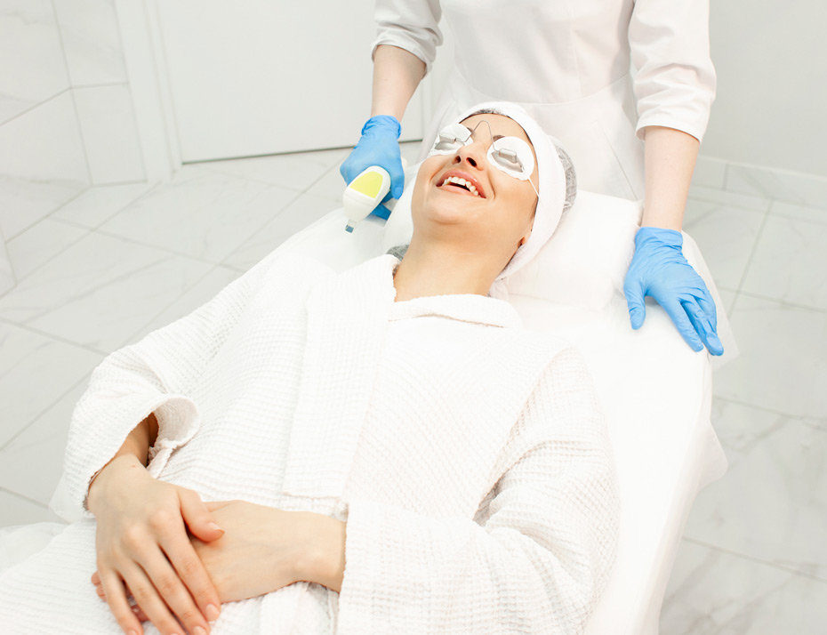 Woman-patient-lies-on-couch-in-cosmetology-clinic