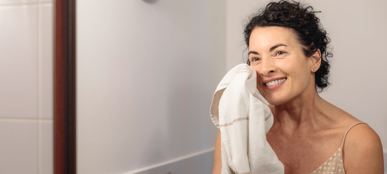 mature-woman-drying-skin-with-towel